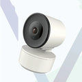 White indoor WiFi security camera with 1080P resolution and automatic motion tracking on a desktop stand