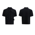 Men's black polo shirt with a deconstructed multi-collar design and geometric pattern detail.