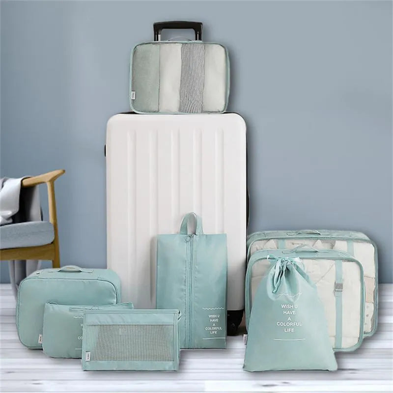 8-piece nylon packing cube set in beige, black, bright blue, gray, Korea Lan, pink, and navy colours for travel organisation