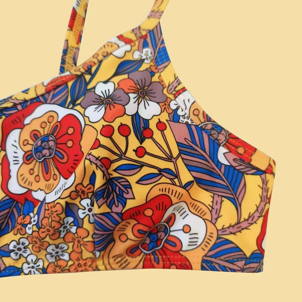 Plus size floral print women's bikini swimsuit with adjustable straps.