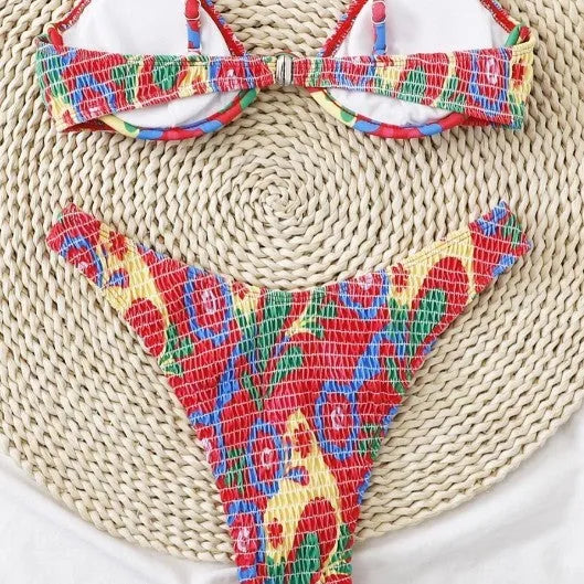 Red floral print women's underwire two-piece bikini swimsuit on a mannequin.