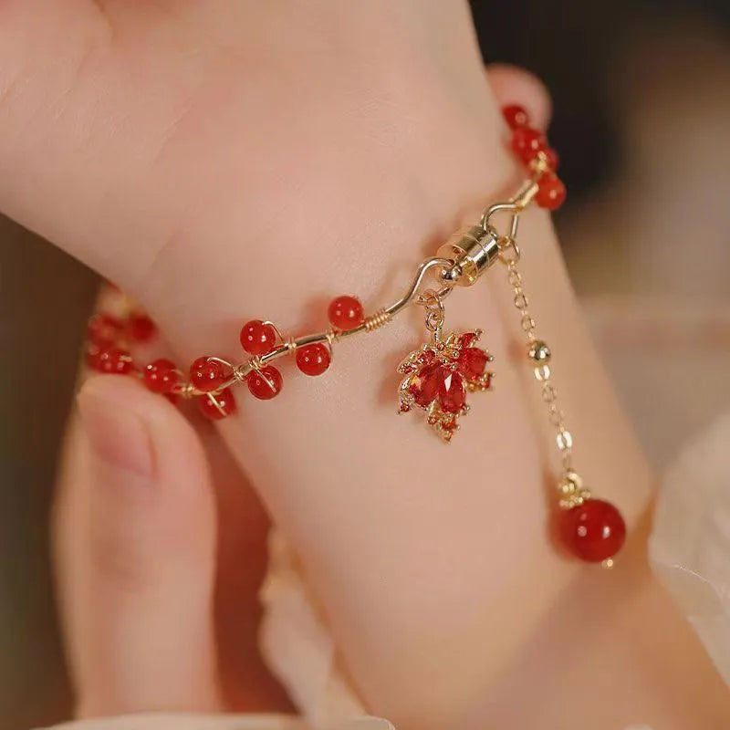 Red ginkgo leaf Chinese style magnetic bracelet with maple leaf girl design and electroplated alloy construction