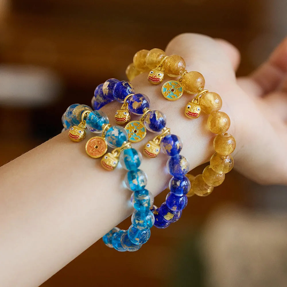 Handmade coloured glaze bracelet with gold foil swallowing gold beast pattern in seven colour options