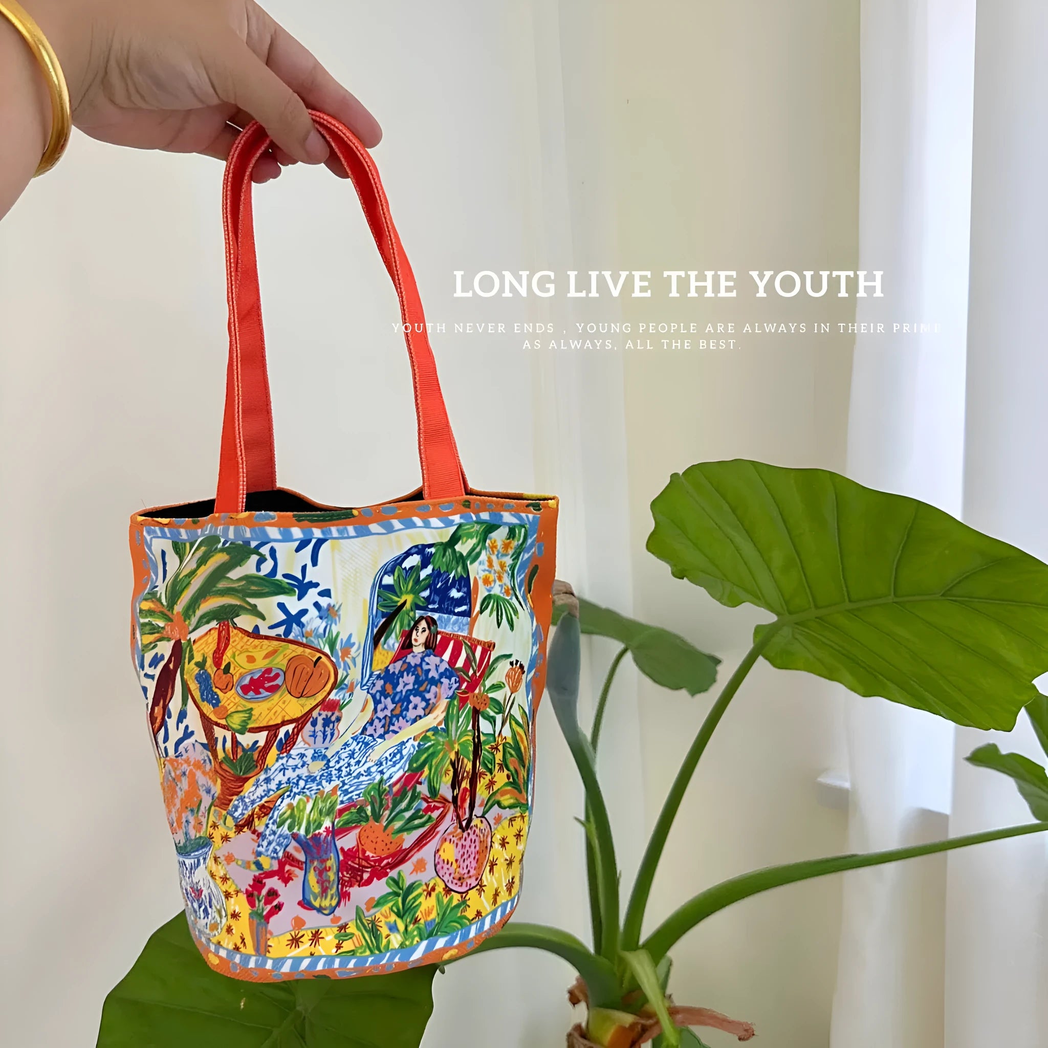Dream Garden orange plush canvas women's bucket bag with double shoulder straps and printed letter details