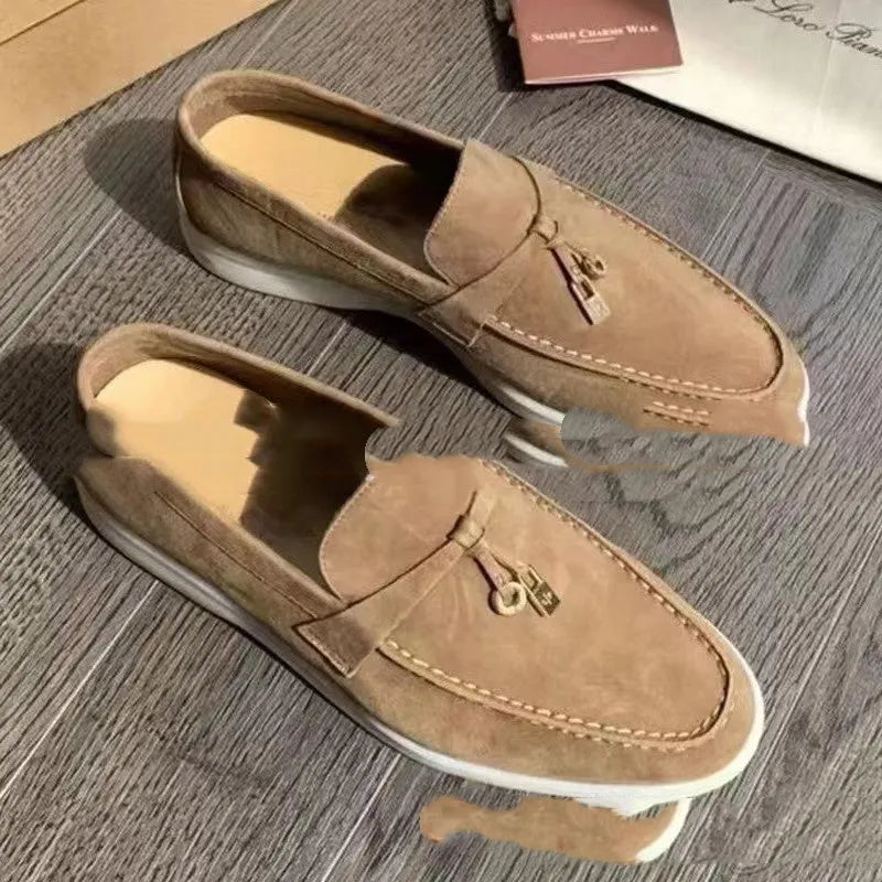 Black high-top slip-on loafers with a round toe and visible sewing line detail on the artificial PU upper.