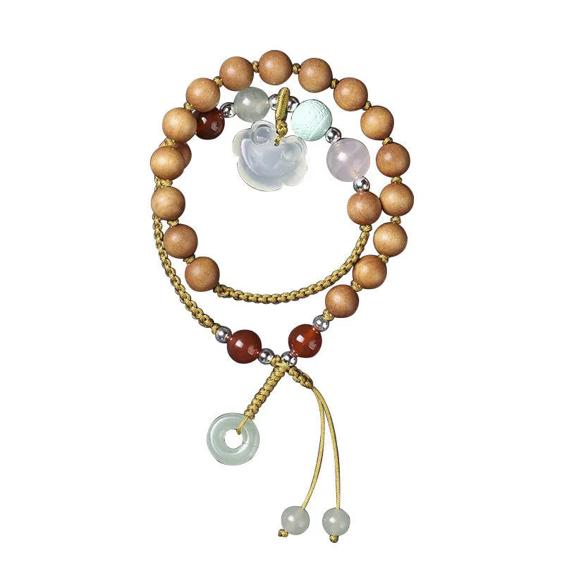 Hand-woven ebony double ring bracelet with traditional jade beads and Ruyi charm elements