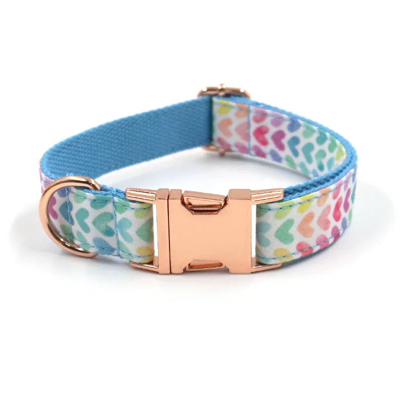 Rose gold cloth adjustable dog collar and lead rope set on a dog
