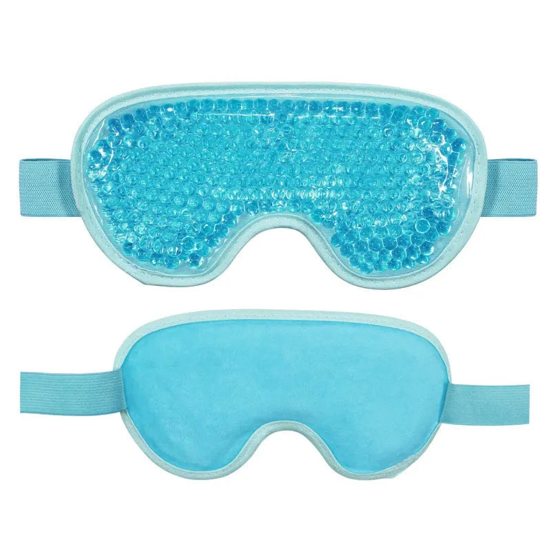 White portable eye massager with cold and hot compress functions and included fabric eye mask