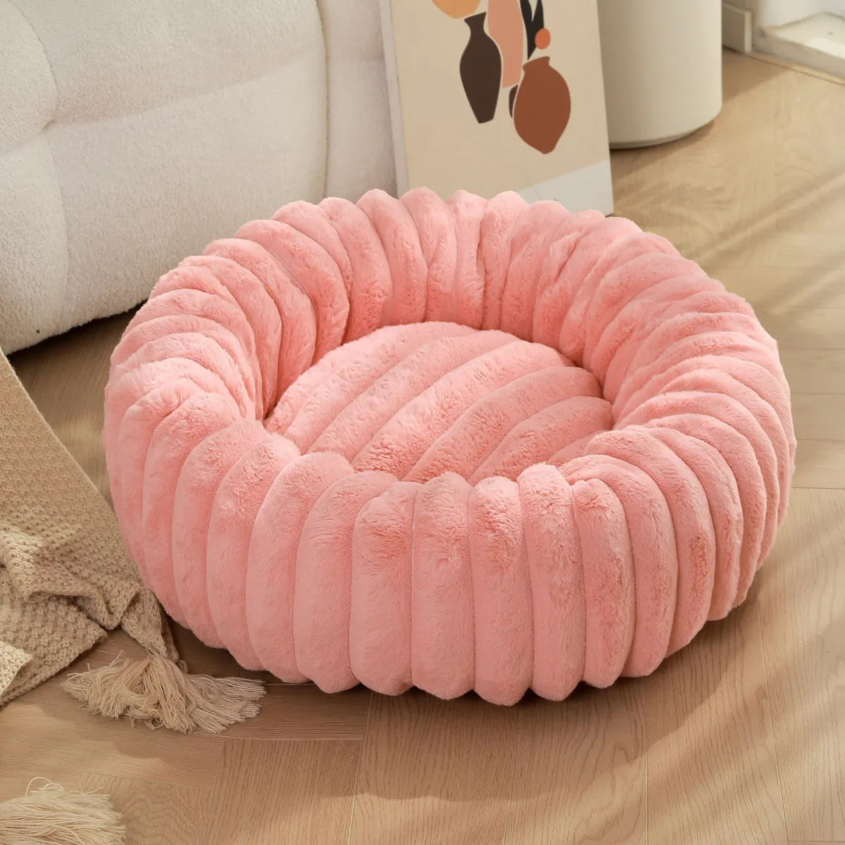Round plush pet bed with long-hair rabbit fur style texture in beige colour