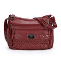 Soft PU leather shoulder bag in wine red with wash finish and outer pocket, 26x19x8cm