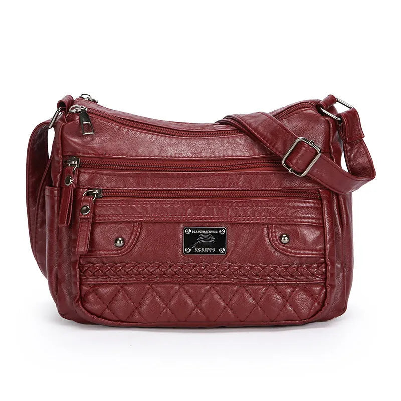 Soft PU leather shoulder bag in wine red with wash finish and outer pocket, 26x19x8cm