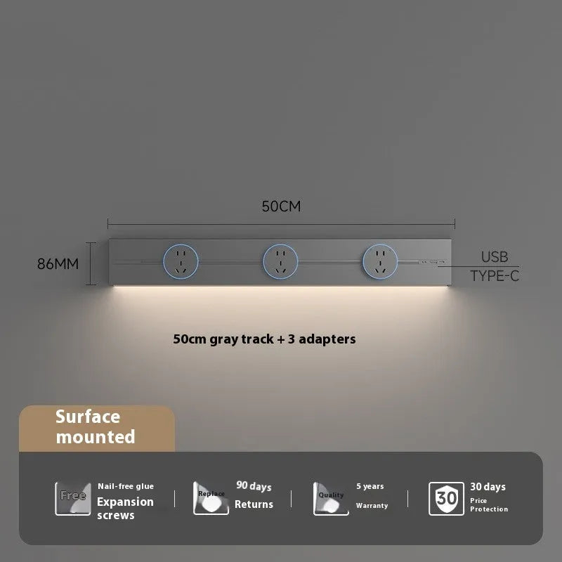Induction lamp rail socket in black on a sideboard cabinet track with white background