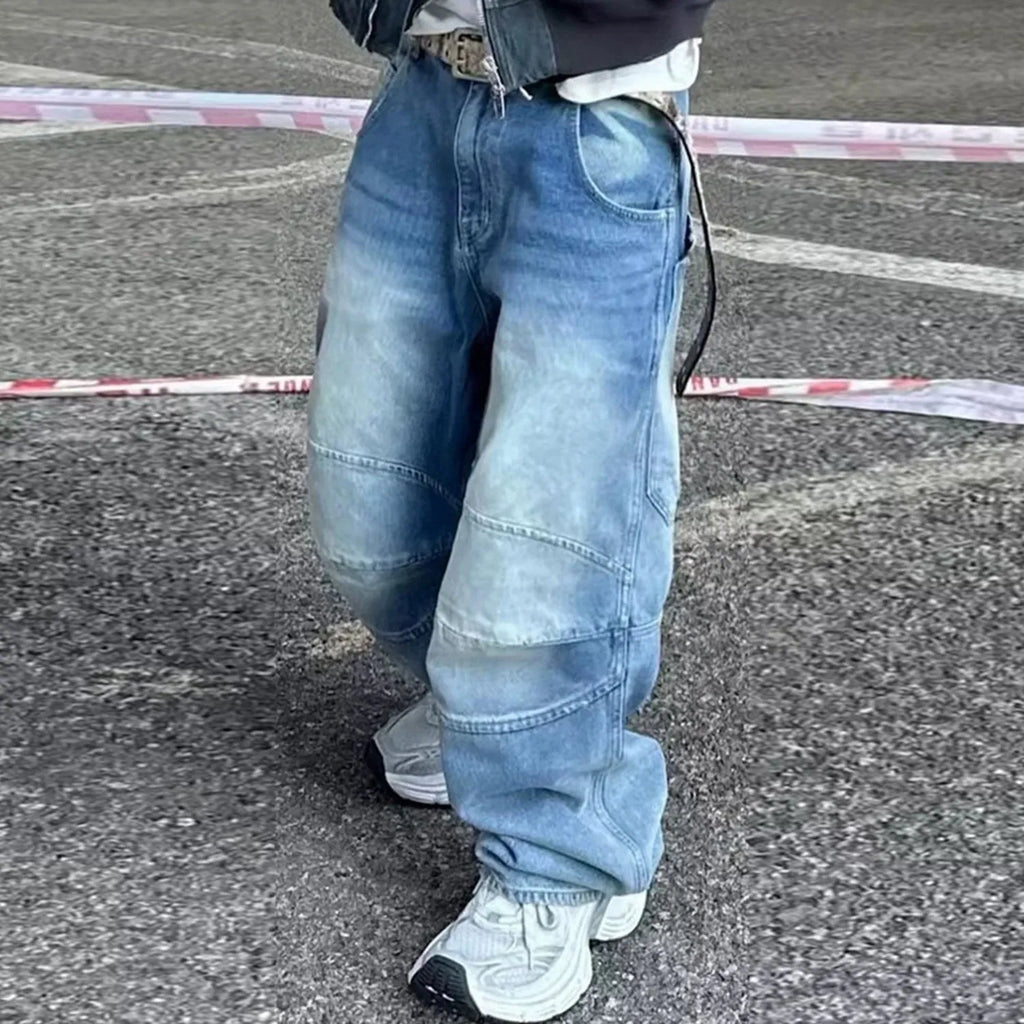 Men's washed blue baggy jeans with pleated front detail and straight-leg cut
