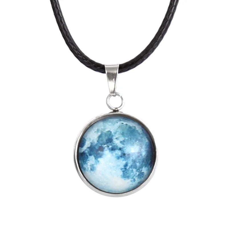 Luminous Christmas moon and starry night sky alloy pendant necklace with coloured glass centrepiece on a chain.