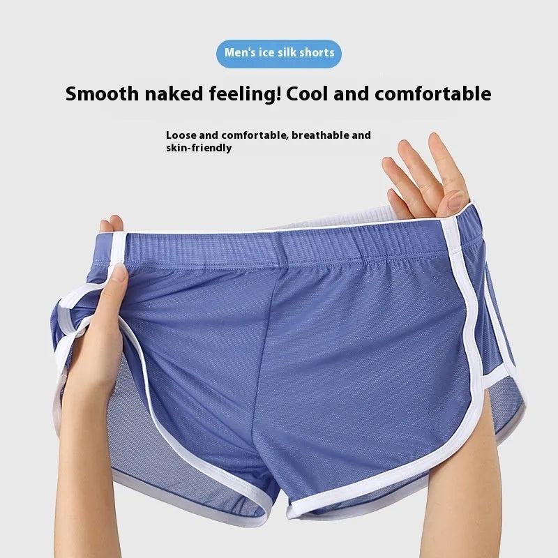 Men's black ice silk mesh boxer briefs with a low waist design on a plain background.