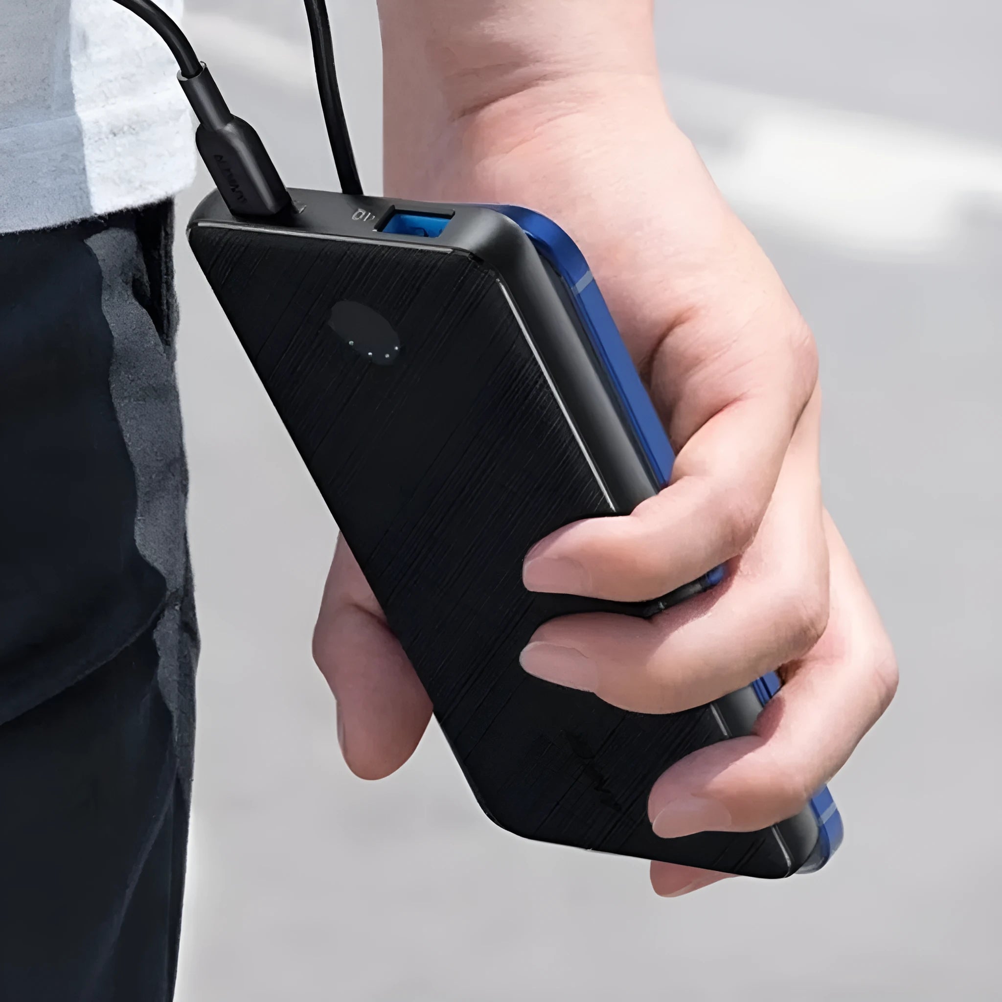 Compact 10000mAh industrial-style PVC power bank with dual ports and PD20W fast charging