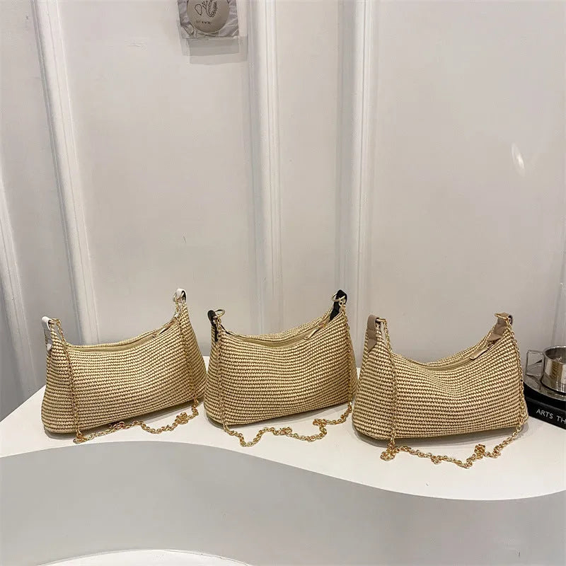 Woven straw crossbody handbag with horizontal square shape and phone compartment