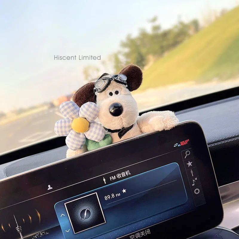 Cute cotton car decoration doll showing a pilot dog design on a dashboard.