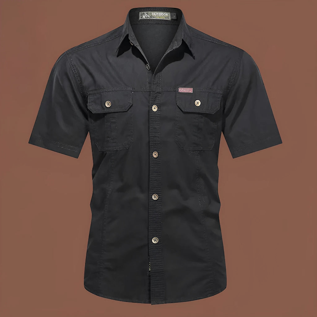 Men's loose beige cotton short sleeve cardigan-style work shirt on a hanger.