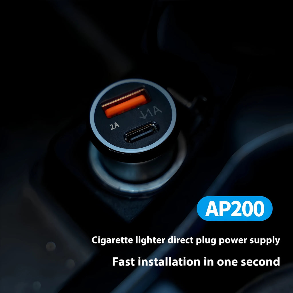 Black plug-in GPS car tracker with magnetic base, shown inserted into a vehicle's 12V lighter socket.