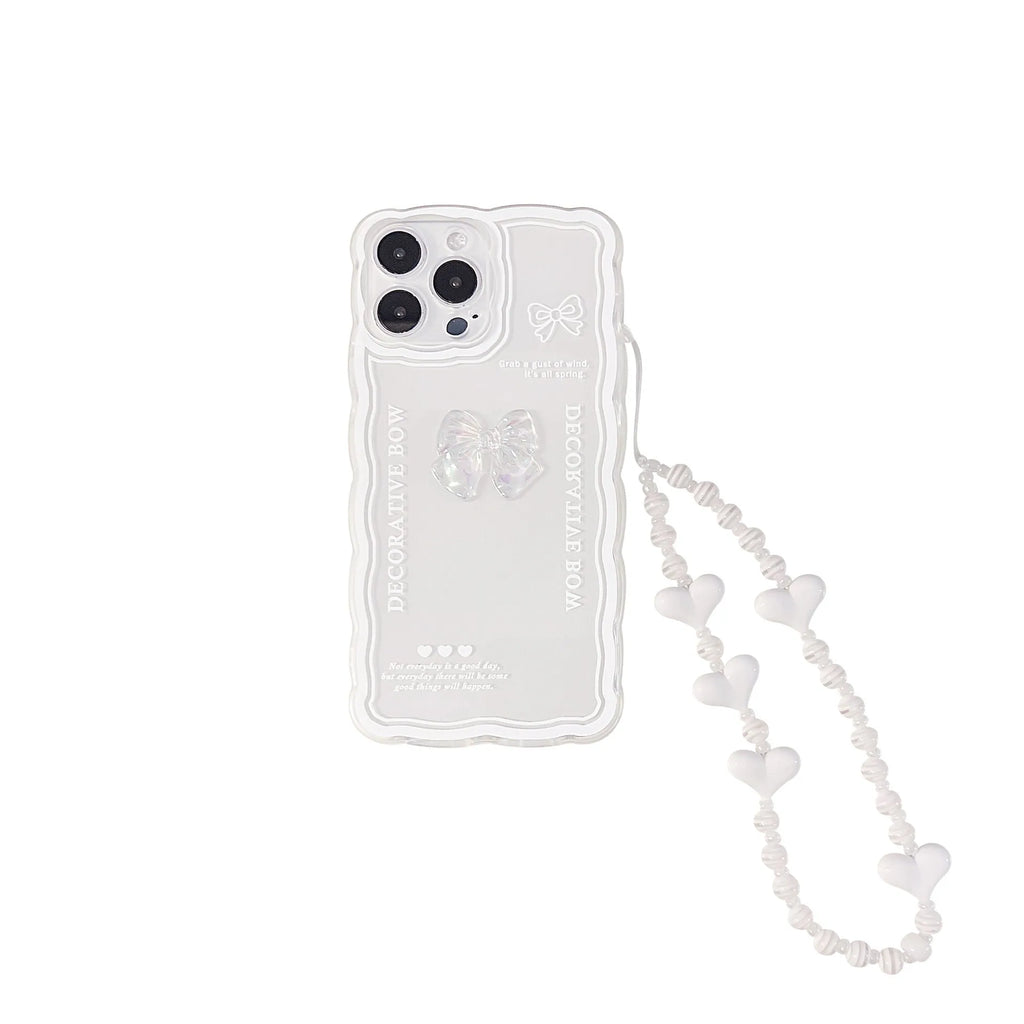 Clear flexible iPhone case with a raised 3D ice-through bow design on the back.