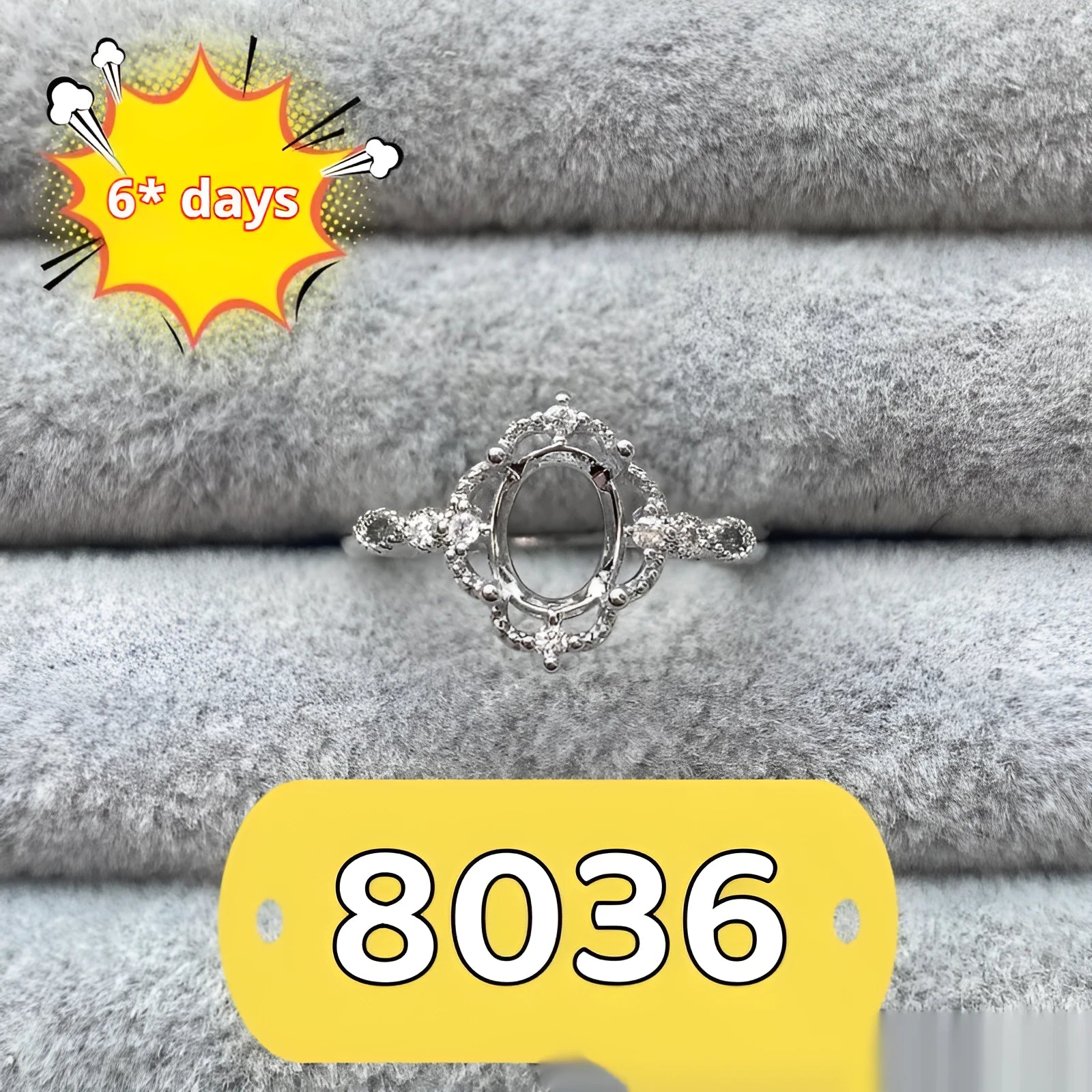Oval denier open mouth ring with 6x8 main stone and five-pointed star design