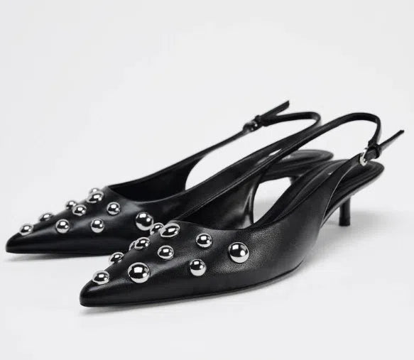 Women's black pointed stiletto wedge heel shoes with rivet decorations and synthetic PU upper