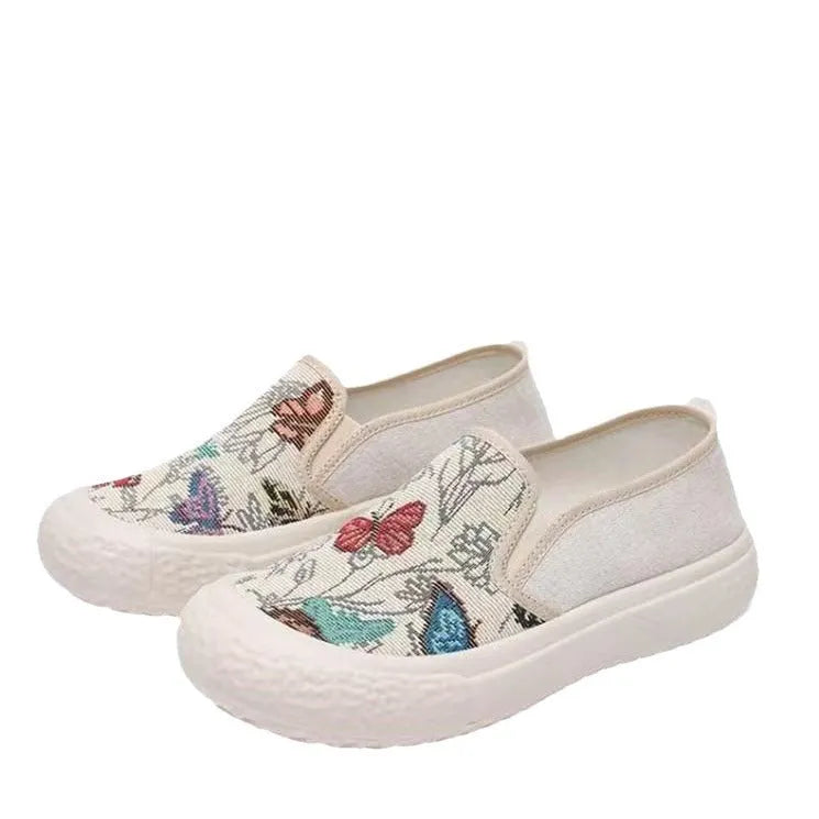Old Beijing women's canvas slip-on shoes with soft plastic soles in black and white colour options