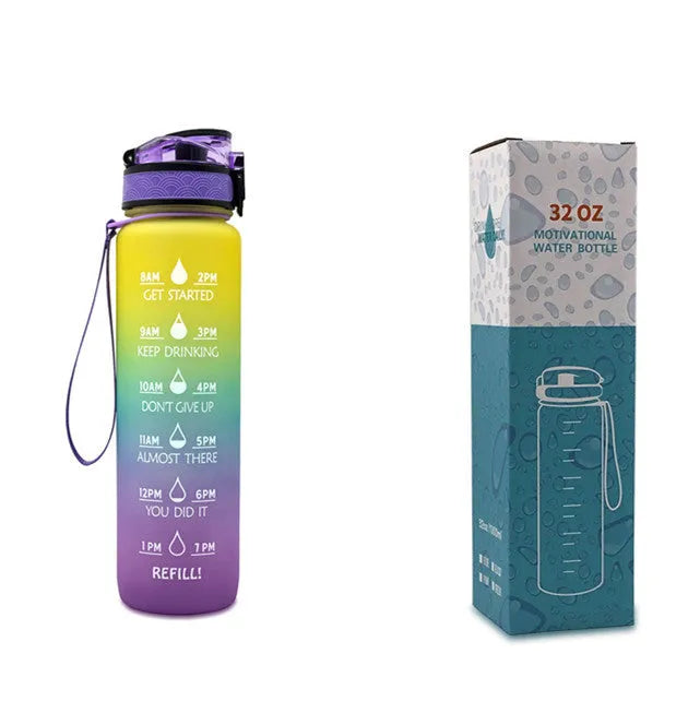 Blue and red gradient 1-litre Tritan sports water bottle with time markers, flip-top lid, and wrist strap.