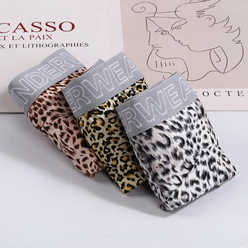Men's loose fit leopard print underwear in grey and yellow colours on a white background