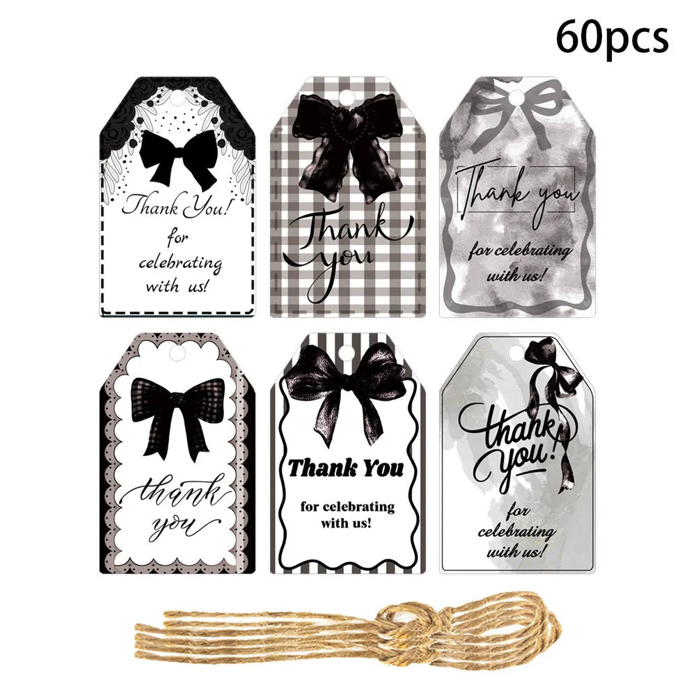 Sixty paper bowknot gift tags with natural hemp rope in three different designs for birthday parties.