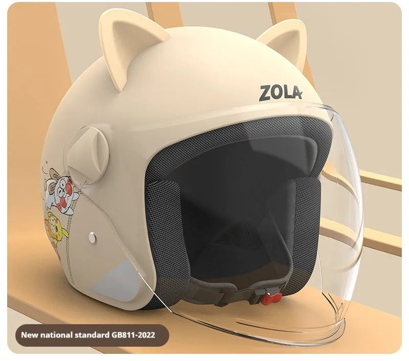 Blue winter cycling helmet with clear anti-fog visor down and integrated grey neck scarf, on a white background.
