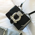 Designer diamond lock shoulder bag for women in quality PU leather, black colour option on display.