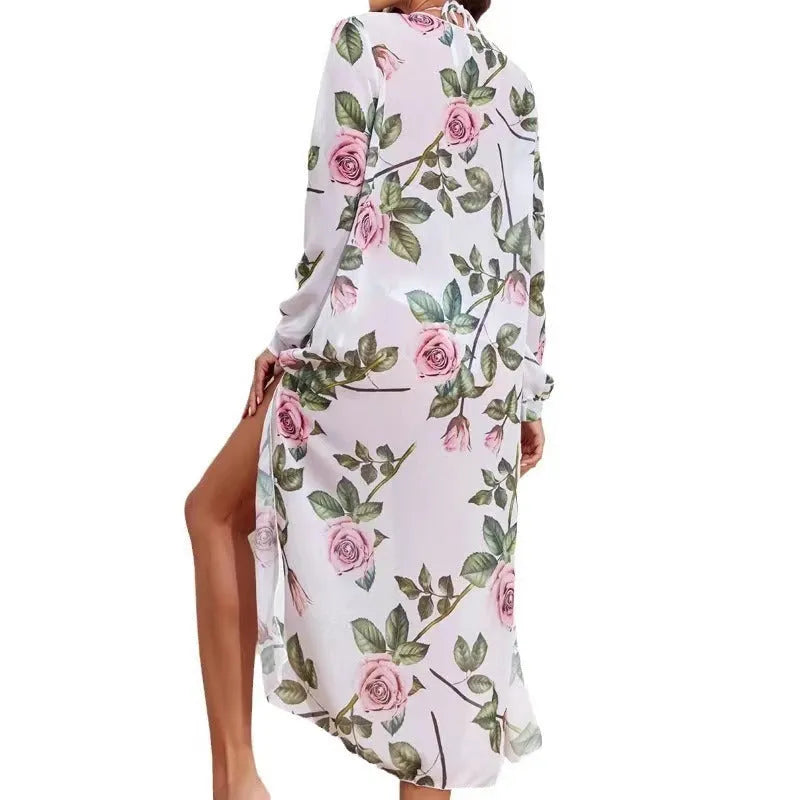 Women's white printed three-piece bikini swimsuit set with bra, shorts, and beach blouse.