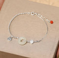 Women's Chinese style Hetian jade bracelet in 925 silver with geometric design and electroplated finish