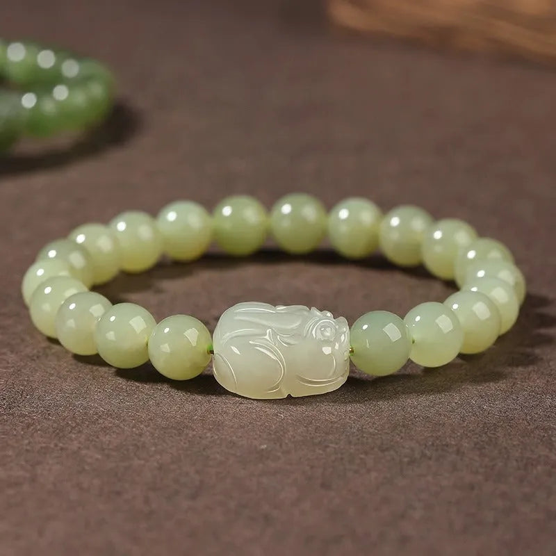 Grey Hetian jade ethnic bracelet with polished beads in 6mm, 8mm, and 10mm size options