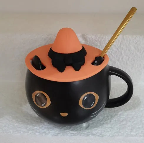 Black ceramic cat-shaped mug with pumpkin decoration and optional spoon lid, 355ml capacity.