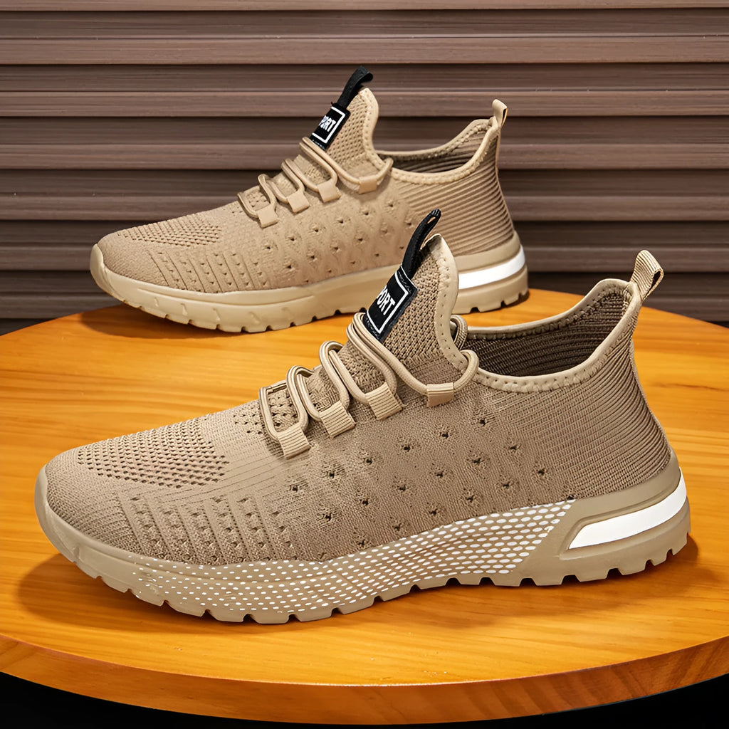 Men's solid colour casual shoes with a mesh upper in Army Green, shown from a side profile.