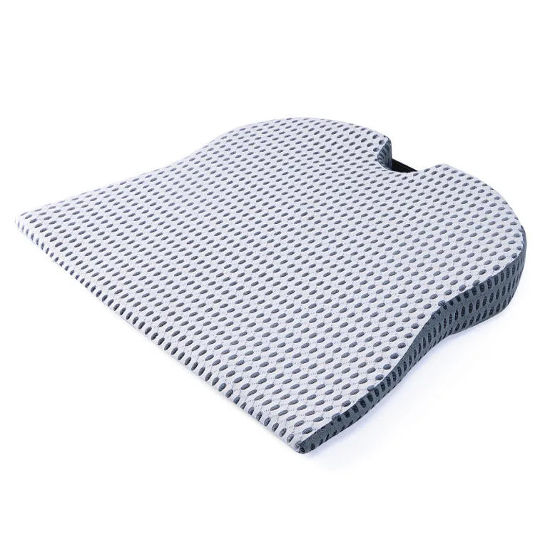 A solid-colour memory foam seat cushion with an adjustable strap, shown in creamy white.