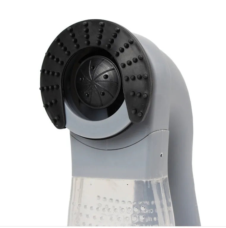 Grey handheld pet hair vacuum cleaner with soft rubber grooming brush head
