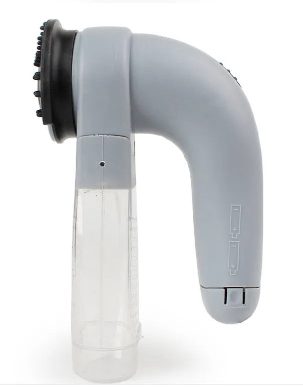 Grey handheld pet hair vacuum cleaner with soft rubber grooming brush head