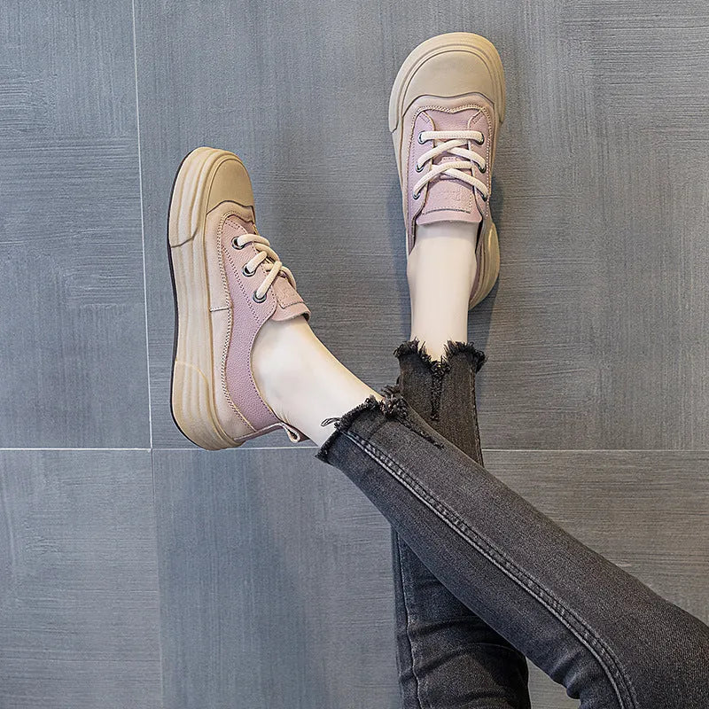 Women's leather platform sneakers in matcha green, purple and orange colours showing front lace-up design