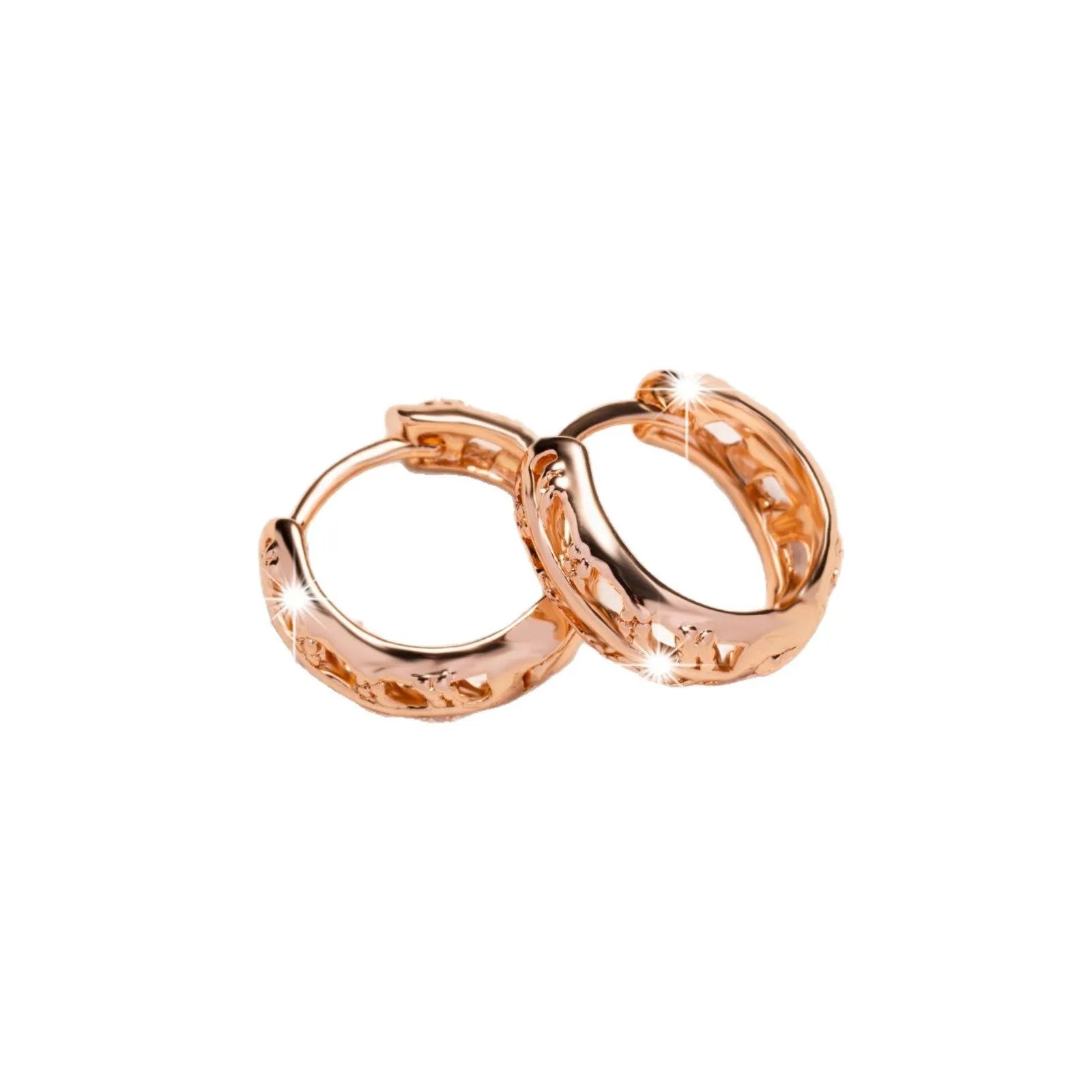 Close-up of rose gold hollowed-out heart and leaf drop earrings showing intricate open metalwork and 2.8cm length.
