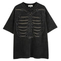Man's loose brown t-shirt with a large black skull and letter graphic print on the front, featuring drop-shoulder sleeves.