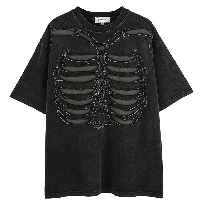 Man's loose brown t-shirt with a large black skull and letter graphic print on the front, featuring drop-shoulder sleeves.