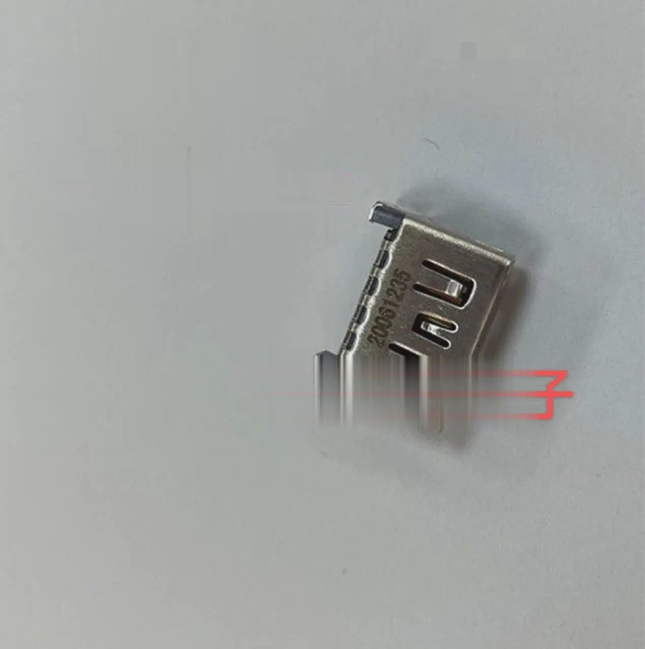 Silver-coloured HDMI interface host socket for games console accessories