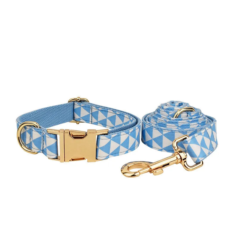 Blue cloth dog vest set with matching collar, rope leash, and bow accessory on dog mannequin