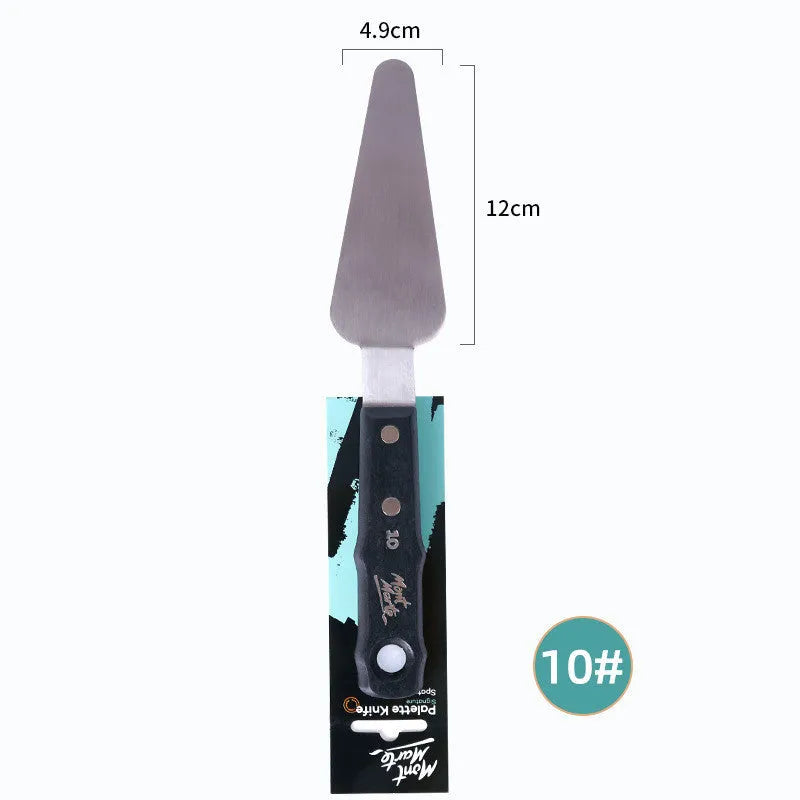 Three stainless steel painting palette knives with different blade shapes on artist's palette