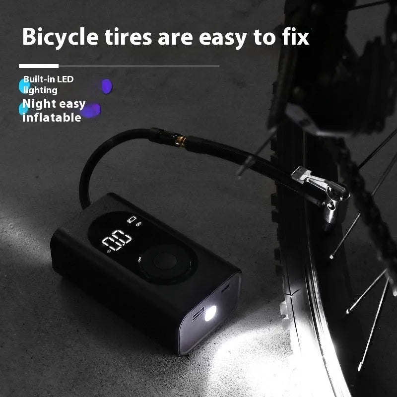 Portable wireless tyre pump with power bank and torch on a black background.