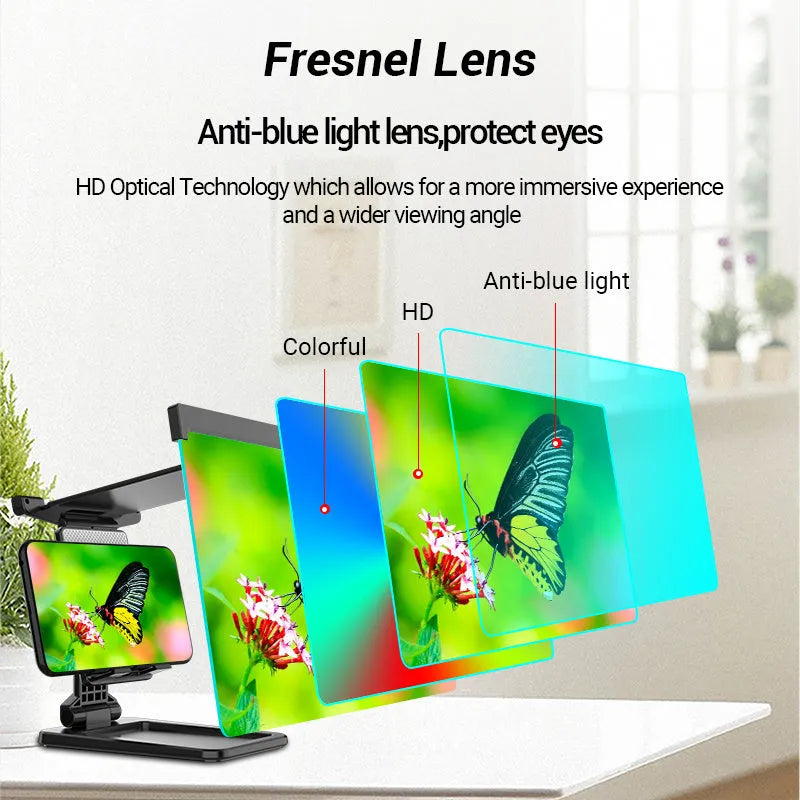 Black foldable mobile phone screen magnifier with detachable shading holder on a desktop.